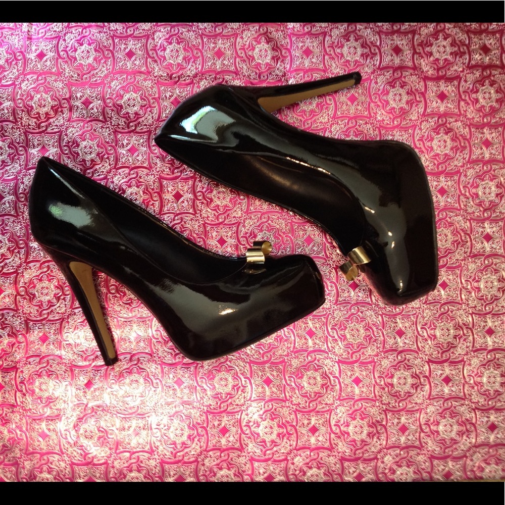 Sexy black platforms with gold bow